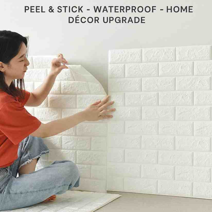 Woman applying 3D white brick wall stickers on a wall with Flasto branding.