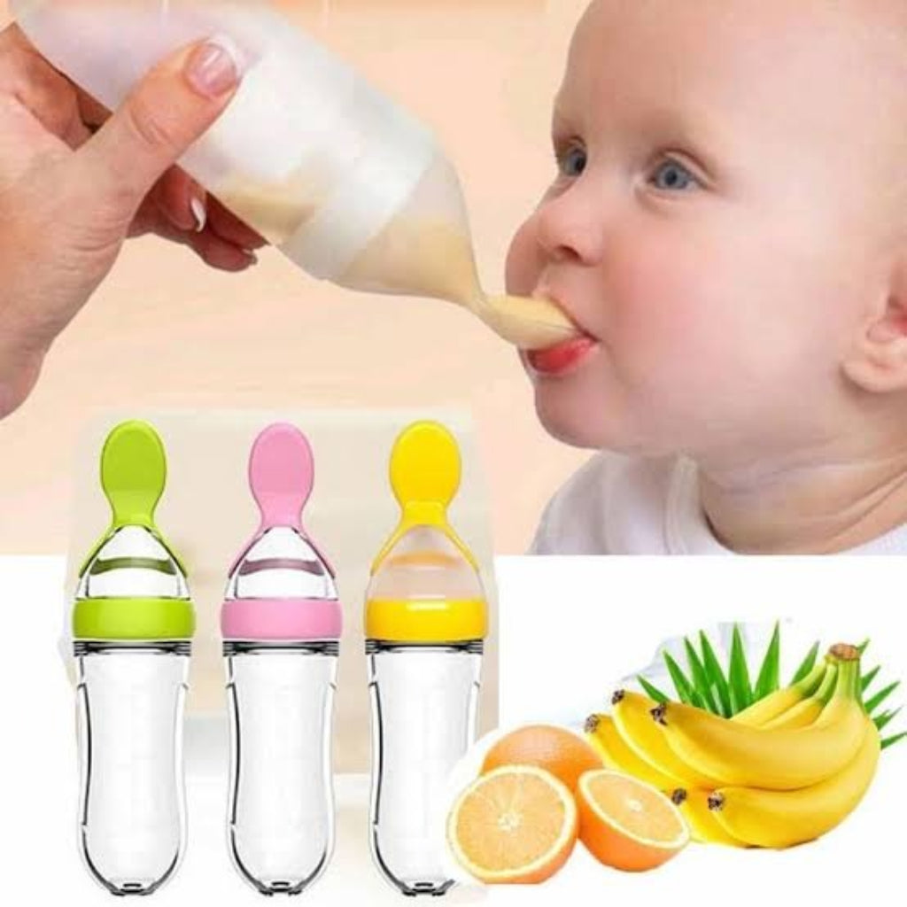 Baby being fed with a bottle and three colorful baby bottles with fruit illustrations.