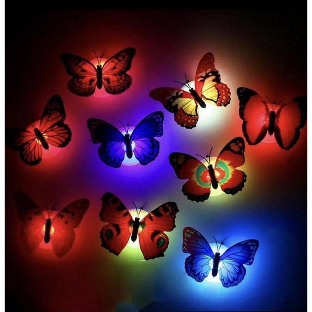 Colorful LED butterfly lights on a dark background