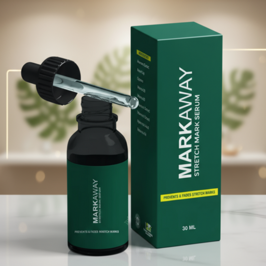 MARKAWAY stretch mark serum bottle and packaging on a reflective surface with a blurred indoor background