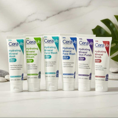 Set of CeraVe skincare products on a marble surface with a plant in the background