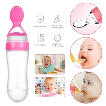 Pink baby feeding bottle with spoon attachment and images of babies using it.