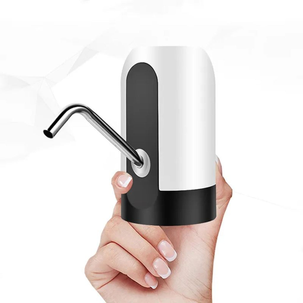 Hand holding a black and white soap dispenser against a white background