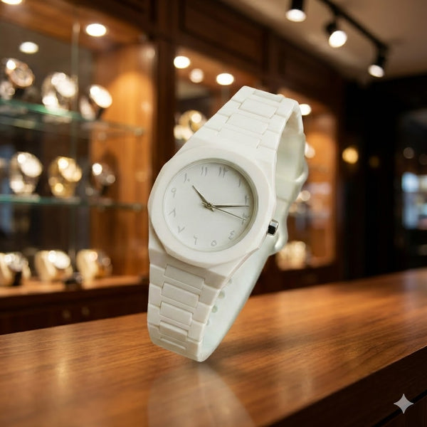 Full aura White watch on a wooden surface with a blurred background